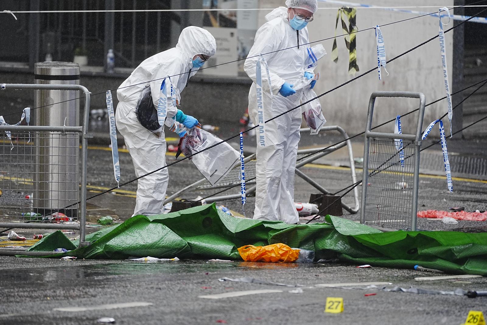 Forensic officers at the scene in Water Street near the Liver Building in Liverpool after a 53-year-old white British man was arrested when a car ploughed into a crowd of people during Liverpool FC's Premier League victory parade. Picture date: Tuesday May 27, 2025. Photo: Peter Byrne/PRESS ASSOCIATION