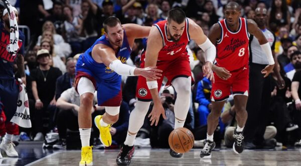May 3, 2025; Denver, Colorado, USA; LA Clippers center Ivica Zubac (40) steals the ball away from Denver Nuggets center Nikola Jokic (15) in the second quarter during game seven of first round for the 2025 NBA Playoffs at Ball Arena. Mandatory Credit: Ron Chenoy-Imagn Images/Sipa USA Photo: Imagn Images/SIPA USA