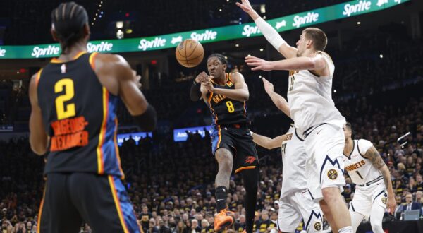 May 7, 2025; Oklahoma City, Oklahoma, USA; Oklahoma City Thunder forward Jalen Williams (8) passes to guard Shai Gilgeous-Alexander (2) as Denver Nuggets center Nikola Jokic (15) defends in the second half during game two of the second round for the 2025 NBA Playoffs at Paycom Center. Mandatory Credit: Alonzo Adams-Imagn Images/Sipa USA Photo: Imagn Images/SIPA USA