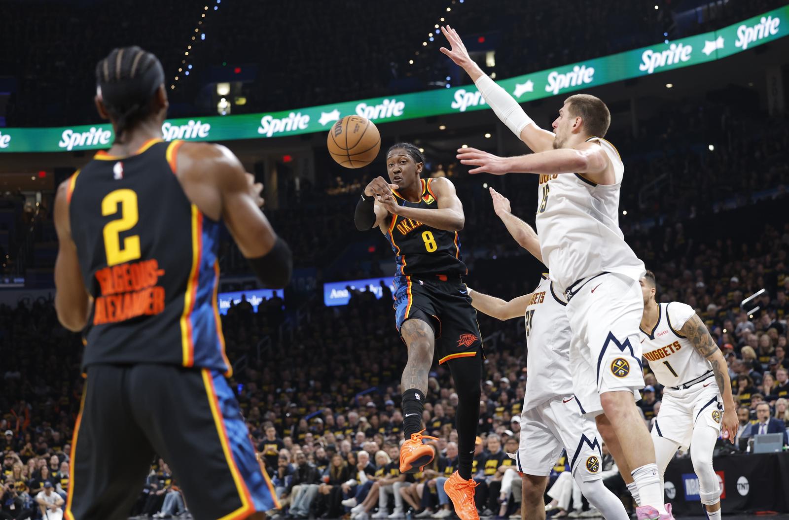 May 7, 2025; Oklahoma City, Oklahoma, USA; Oklahoma City Thunder forward Jalen Williams (8) passes to guard Shai Gilgeous-Alexander (2) as Denver Nuggets center Nikola Jokic (15) defends in the second half during game two of the second round for the 2025 NBA Playoffs at Paycom Center. Mandatory Credit: Alonzo Adams-Imagn Images/Sipa USA Photo: Imagn Images/SIPA USA
