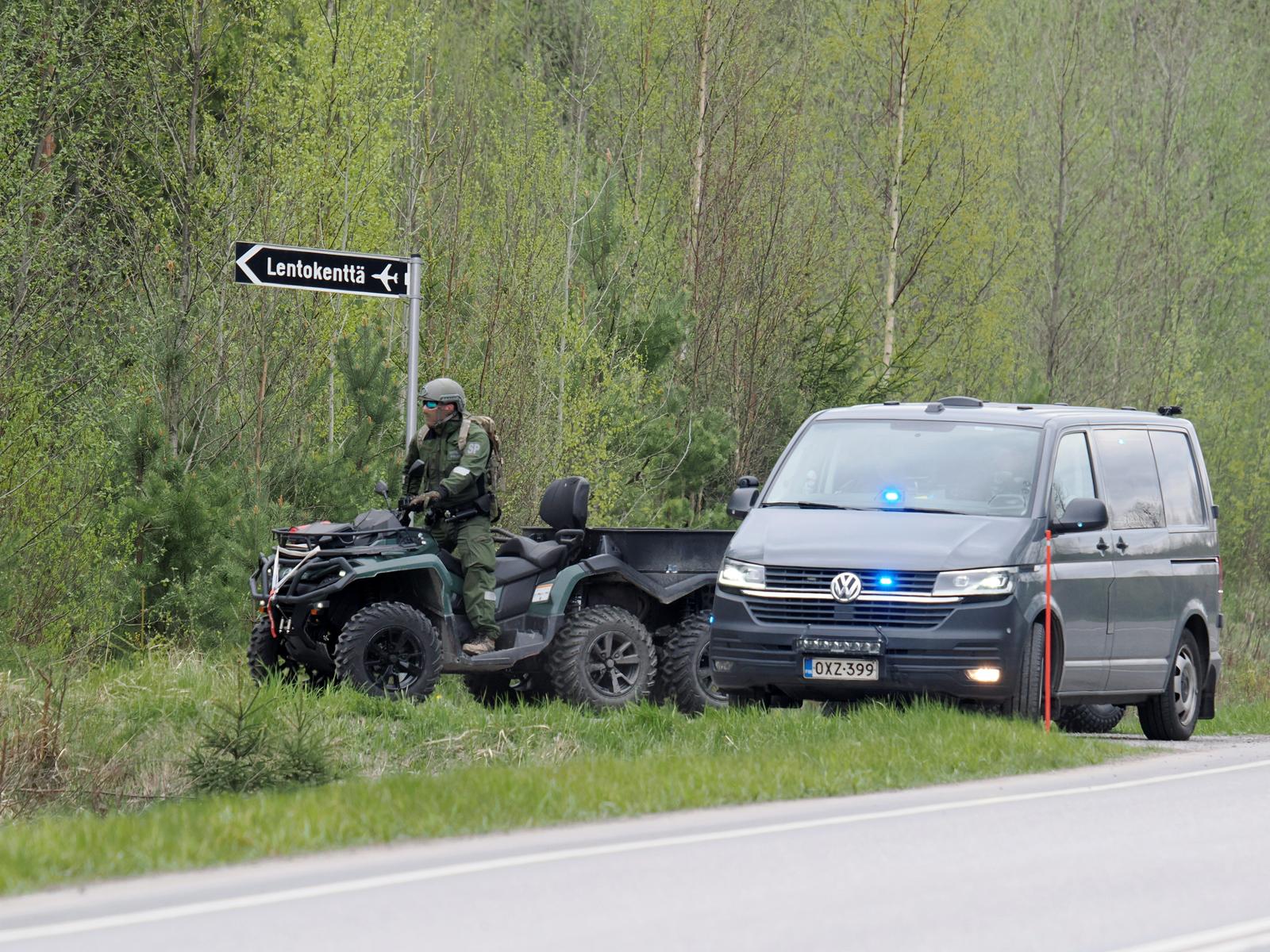 An ATV passes a police vehicle to enter the crash site near the Eura Airfield in Eura, Finland, on May 17, 2025. Two civilian helicopters crashed in Eura on Saturday, according to the Satakunta rescue department. Rescue workers have located the helicopters in a forested area. Two civilian helicopters crashed in Eura on Saturday, according to the Satakunta rescue department. The authorities have declined to provide information regarding possible casualties so far. (Photo by JUHA HARJU/LEHTIKUVA/Sipa USA)PETRI HAKOSALO   Photo: STT-Lehtikuva/SIPA USA