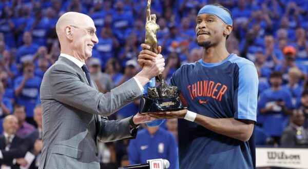May 22, 2025; Oklahoma City, Oklahoma, USA; NBA commissioner is Adam Silver presents Oklahoma City Thunder guard Shai Gilgeous-Alexander (2) with the Michael Jordan Trophy for winning the most valuable player award for the 2024-25 season before game two of the western conference finals for the 2025 NBA Playoffs at Paycom Center. Mandatory Credit: Alonzo Adams-Imagn Images/Sipa USA Photo: Imagn Images/SIPA USA