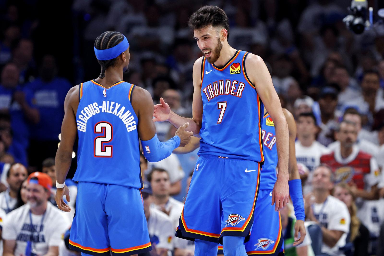 May 28, 2025; Oklahoma City, Oklahoma, USA; Oklahoma City Thunder forward Chet Holmgren (7) and guard Shai Gilgeous-Alexander (2) celebrates during the second quarter against the Minnesota Timberwolves in game five of the western conference finals for the 2025 NBA Playoffs at Paycom Center. Mandatory Credit: Alonzo Adams-Imagn Images/Sipa USA Photo: Imagn Images/SIPA USA