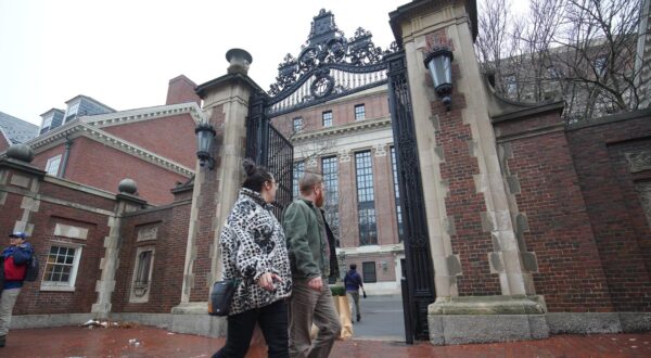People walk in front of the gate of Harvard University in Boston. (Photo by Michael Ho Wai Lee / SOPA Images/Sipa USA) Photo: SOPA Images/SIPA USA