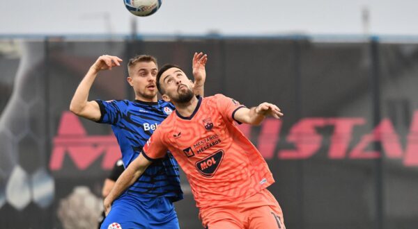 02.04.2025., Gradski stadion "Ivan Kusek Apas", Koprivnica - SuperSport Hrvatski nogometni kup 2024./25., polufinale, NK Slaven Belupo - NK Osijek. Antonio Bosec i Arnel Jakupovic Photo: Vjeran Zganec Rogulja/PIXSELL