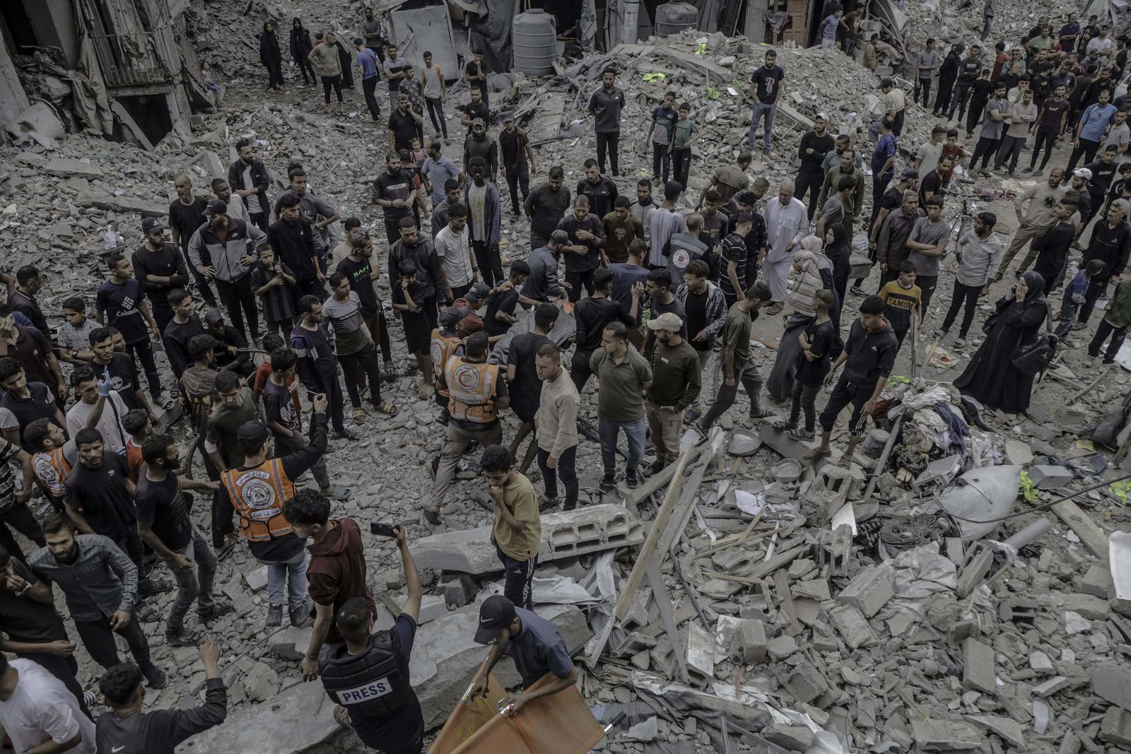 Paramedics and Palestinian people carry the bodies of people killed in Israel's attack on al-Touba (al-Tawbah) Mosque west of Jabalia Camp, north of the Gaza Strip on May 15, 2025. Photo by Abood Abusalama/Middle East Images/ABACAPRESS.COM Photo: Middle East Images/ABACA/ABACA
