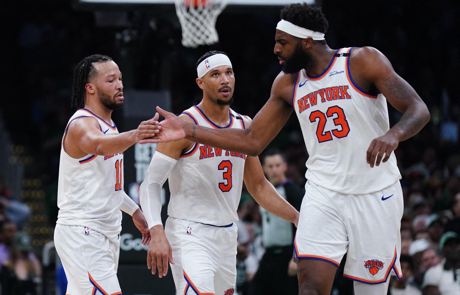 May 7, 2025; Boston, Massachusetts, USA; New York Knicks guard Jalen Brunson (11) and center Mitchell Robinson (23) react after a play against the Boston Celtics in the second half during game two of the second round for the 2025 NBA Playoffs at TD Garden. Mandatory Credit: David Butler II-Imagn Images Photo: David Butler II/REUTERS