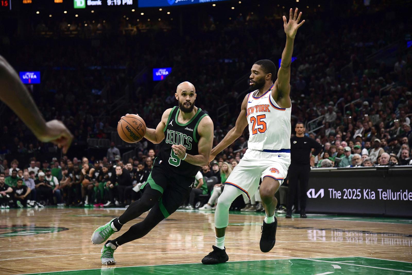 May 14, 2025; Boston, Massachusetts, USA; New York Knicks forward Mikal Bridges (25) defends Boston Celtics guard Derrick White (9) in the second half during game five of the second round for the 2025 NBA Playoffs at TD Garden. Mandatory Credit: Bob DeChiara-Imagn Images Photo: Bob DeChiara/REUTERS