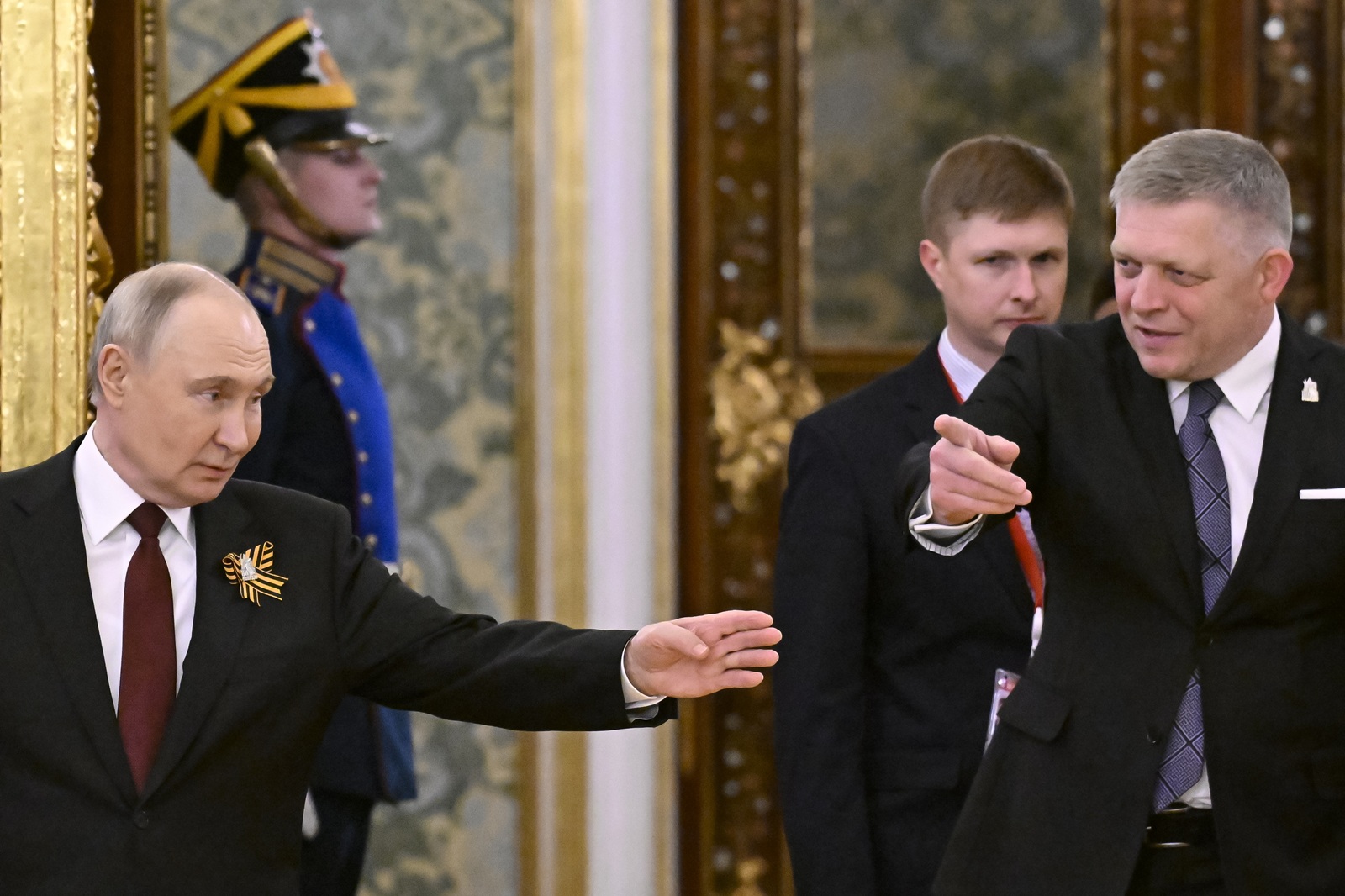 epa12087711 Russian President Vladimir Putin (L) meets with Slovak Prime Minister Robert Fico (R) at the Kremlin in Moscow, Russia, 09 May 2025. Russia marks the 80th anniversary of the victory in World War II over Nazi Germany and its allies.  EPA/ALEXANDER NEMENOV/AFP POOL