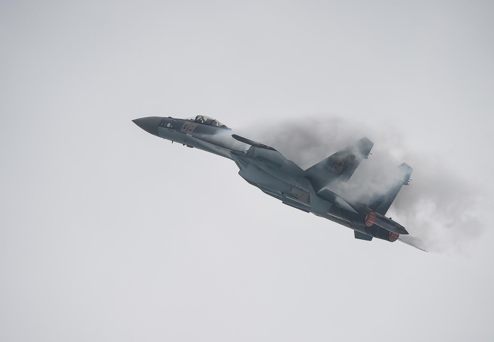 CHINA-ZHUHAI-AIRSHOW(CN) (141111) -- ZHUHAI, Nov. 11, 2014 (Xinhua) -- A Sukhoi SU-35 fighter jet performs a test flight  ahead of the 10th China International Aviation and Aerospace Exhibition in Zhuhai, south China's Guangdong Province, Nov. 10, 2014. Some 700 exhibitors at home and abroad with 130-plus planes will attend the six-day airshow from November 11 to 16. (Xinhua/Liu Dawei) (ry)Liu Dawei Photo: XINHUA/PIXSELL