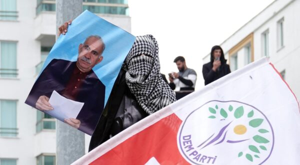 A young demonstrator is seen carrying a poster of PKK leader Abdullah Ocalan at the Newroz celebration in Diyarbakir. At the Newroz celebration, which was celebrated on March 21 in the city of Diyarbakir in Turkey and attended by hundreds of thousands of people, a large number of demonstrators carried posters of Abdullah Ocalan, the leader of the Kurdish armed organization Kurdistan Workers' Party (PKK). Abdullah Ocalan, who has been held in prison for 25 years, had asked the PKK, an organization that has been in conflict with the Turkish army for 40 years, to lay down its weapons and dissolve itself. The peace negotiations between the PKK and the Turkish state are continuing. (Photo by Mehmet Masum Suer / SOPA Images/Sipa USA) Photo: SOPA Images/SIPA USA