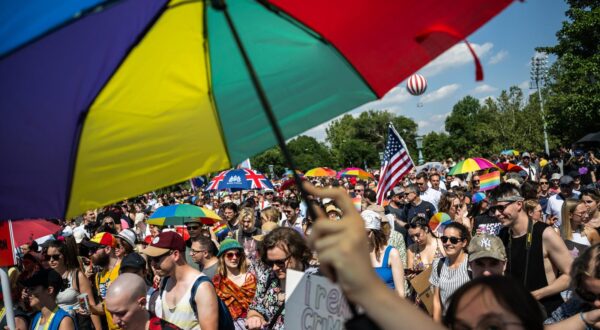 15 July 2023, Hungary, Budapest: People take part in the Pride parade in Budapest. For the past two years, Hungary has had a so-called "child protection law" that falsely equates homosexuality with pedophilia. The law prohibits providing young people with information about homosexuality, transsexuality or gender reassignment. Photo: Marton Monus/dpa Photo: MARTON MONUS/DPA