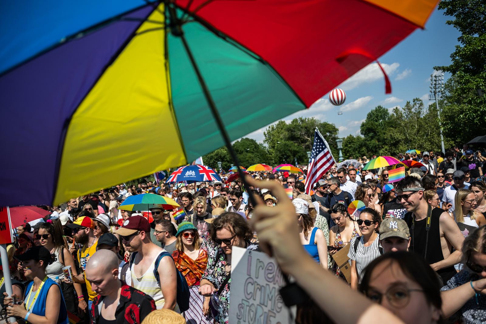 15 July 2023, Hungary, Budapest: People take part in the Pride parade in Budapest. For the past two years, Hungary has had a so-called "child protection law" that falsely equates homosexuality with pedophilia. The law prohibits providing young people with information about homosexuality, transsexuality or gender reassignment. Photo: Marton Monus/dpa Photo: MARTON MONUS/DPA