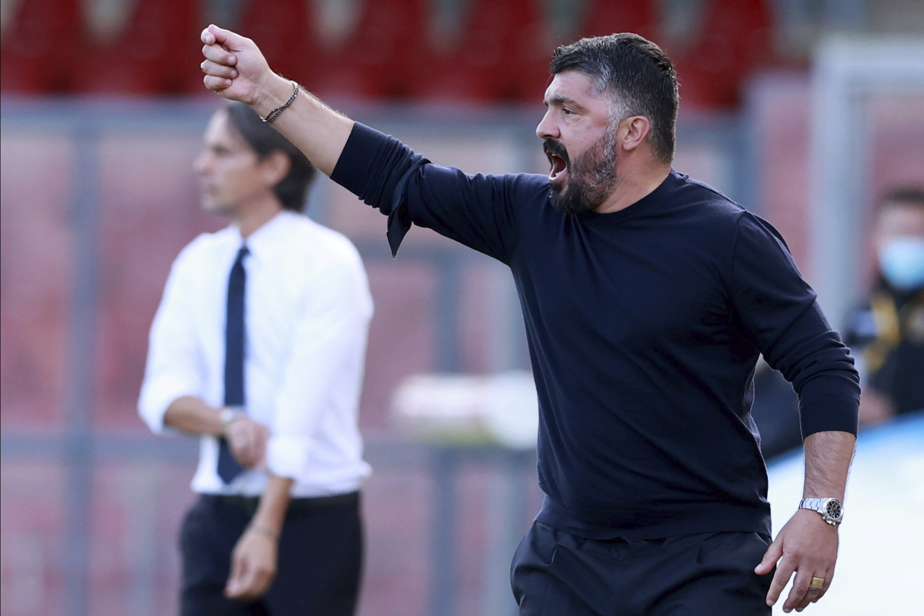 Napolis coach Gennaro Gattuso gives indications to his players during a Serie A soccer match between Napoli and Benevento, in the Ciro Vigorito stadium in Benevento, Italy, Sunday, Oct. 25, 2020. (Alessandro Garofalo/LaPresse via AP)