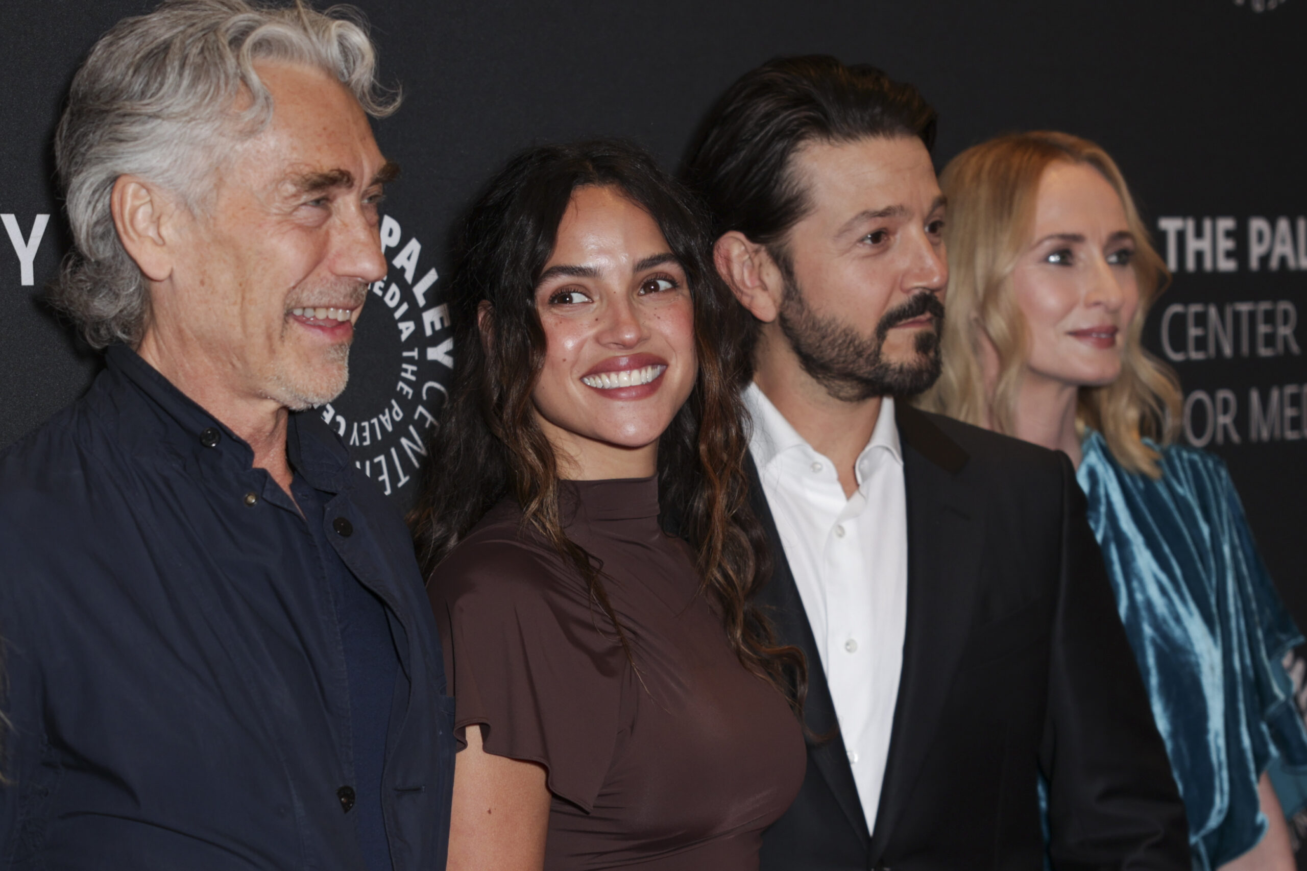 Tony Gilroy, from left, Adria Arjona, Diego Luna, and Genevieve O'Reilly arrive at PaleyLive's An Evening with Andor on Friday, May 30, 2025, at Writers Guild Theater in Beverly Hills, Calif. (Photo by Andrew Park/Invision/AP)