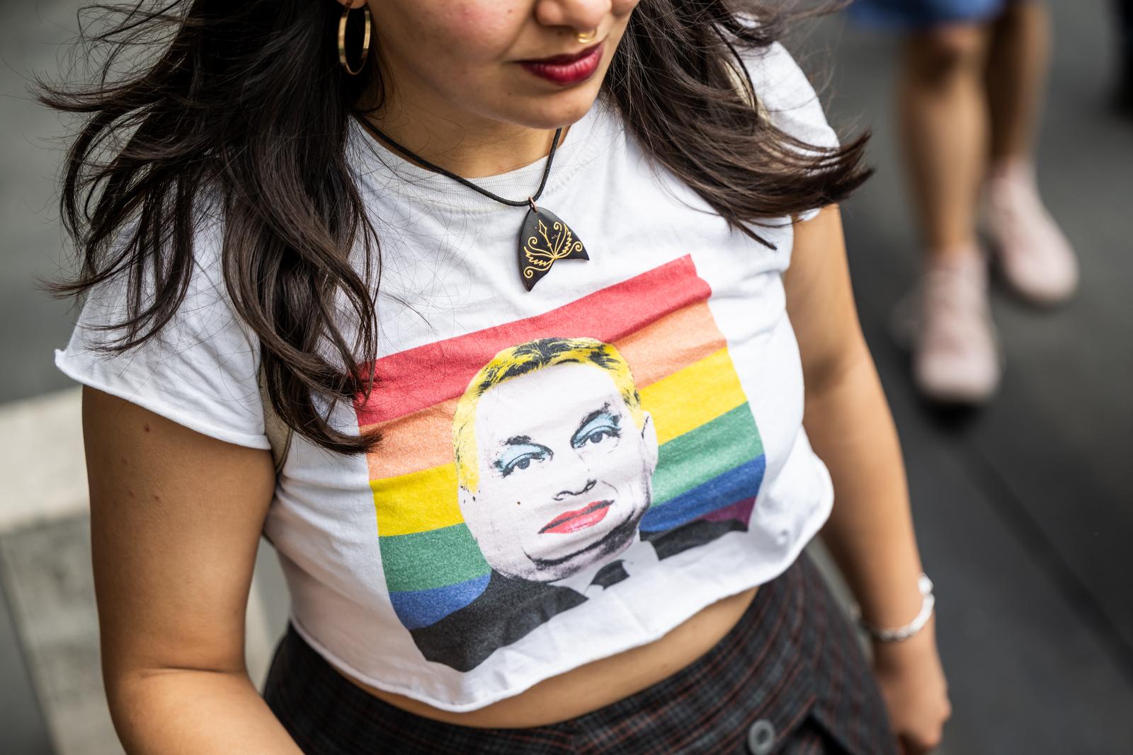 11 May 2024, Hungary, Budapest: The face of Prime Minister Viktor Orban can be seen on the T-shirt of a participant in the Trans Pride march. Photo: Marton Monus/dpa Photo: MARTON MONUS/DPA