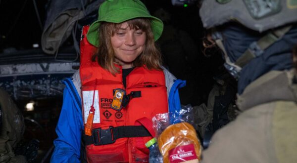 Greta Thunberg is all smiles in the early morning of Monday, June 9, 2025, after the Israeli Defense Forces boarded the "Madleen," a small civilian maritime vessel previously bound for Gaza with humanitarian aid, and rerouted those on board toward Israel, the foreign ministry said. The "Madleen" is part of the Freedom Flotilla Coalition carrying aid to the region that set sail from Sicily on June 1. Photo via Israel Foreign Ministry/UPI Photo via Newscom Photo: ISRAEL MFA/NEWSCOM