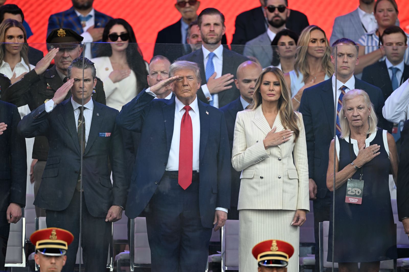 epa12176141 U.S. Army personnel and military equipment are reviewed by US First Lady Melania Trump (2-R), US President Donald Trump (2-L), and Pete Hegseth (L), US secretary of defense, during the US Army's 250th Anniversary Parade in Washington, DC, USA, 14 June 2025. The parade, which happens to coincide with US President Donald Trump’s 79th birthday, is expected to cost up to $45 million and feature 6,600 soldiers, 50 helicopters and 60-ton M1 Abrams battle tanks.  EPA/KENNY HOLSTON / POOL