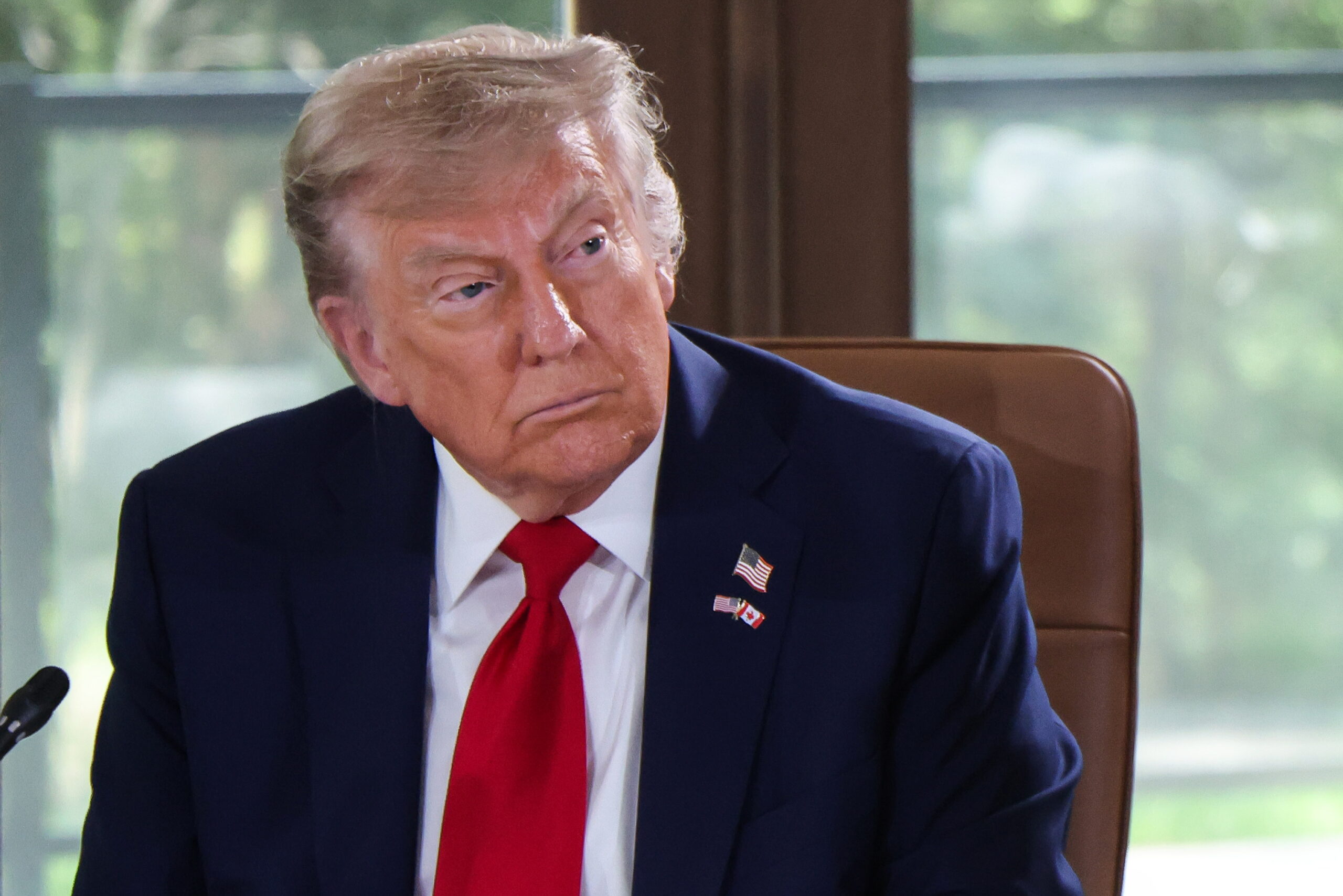 epa12179671 US President Donald Trump attends a working session during the Group of Seven (G7) Summit at the Pomeroy Kananaskis Mountain Lodge in Kananaskis, Alberta, Canada, 16 June 2025.  EPA/LUDOVIC MARIN / POOL
