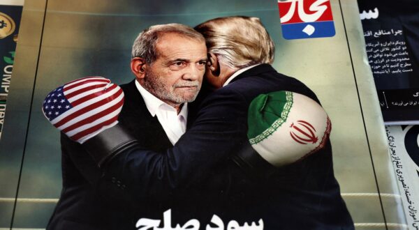 epa12153515 A copy of the Iranian magazine Tejarat Farda, titled 'The benefit of peace,' features an image of Iranian President Masoud Pezeshkian and US President Donald Trump embracing while wearing boxing gloves at a kiosk in Tehran, Iran, 03 June 2025. On 02 June 2025, Trump stated he ruled out allowing Iran to enrich uranium under a potential new nuclear deal between Iran and the US. According to the IRNA news agency, Pezeshkian said on 03 June 2025, that Iran would not accept this condition and would not relinquish its peaceful right to enrich uranium.  EPA/ABEDIN TAHERKENAREH