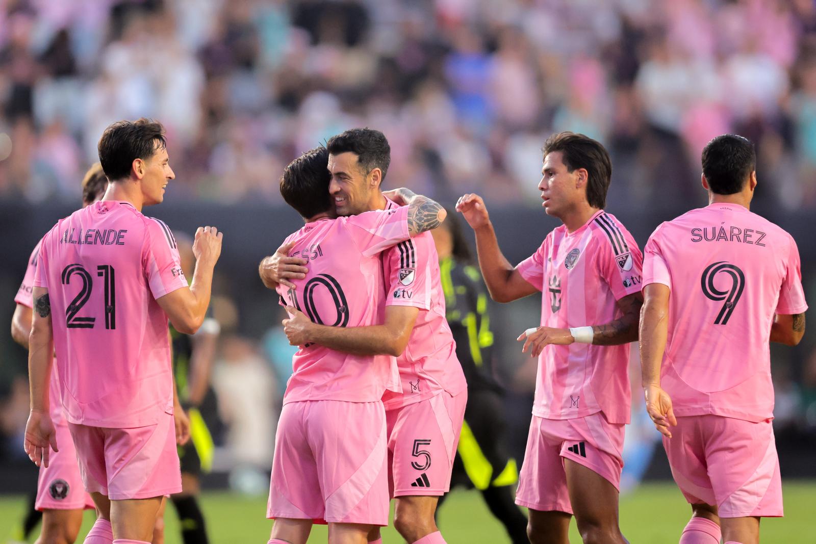 May 31, 2025; Fort Lauderdale, Florida, USA; Inter Miami CF forward Lionel Messi (10) celebrates with midfielder Sergio Busquets (5) after scoring against the Columbus Crew during the first half at Chase Stadium. Mandatory Credit: Sam Navarro-Imagn Images/Sipa USA Photo: Imagn Images/SIPA USA
