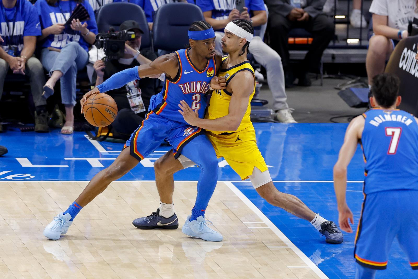 Jun 8, 2025; Oklahoma City, Oklahoma, USA; Oklahoma City Thunder guard Shai Gilgeous-Alexander (2) looks to move the ball to the basket past Indiana Pacers guard Andrew Nembhard (2) during the third quarter of game two of the 2025 NBA Finals at Paycom Center. Mandatory Credit: Alonzo Adams-Imagn Images/Sipa USA Photo: Imagn Images/SIPA USA