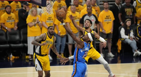 Jun 11, 2025; Indianapolis, Indiana, USA; Oklahoma City Thunder guard Shai Gilgeous-Alexander (2) shoots the ball against Indiana Pacers guard Tyrese Haliburton (0) during the first half during game three of the 2025 NBA Finals at Gainbridge Fieldhouse. Mandatory Credit: Kyle Terada-Imagn Images/Sipa USA Photo: Imagn Images/SIPA USA