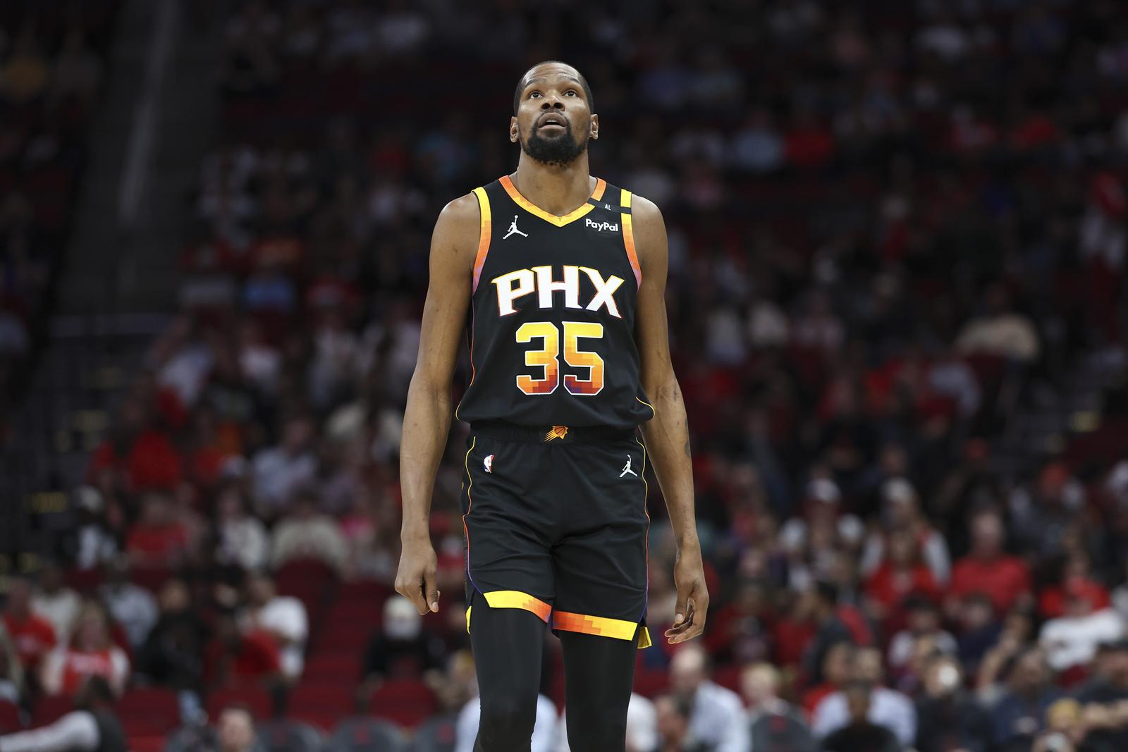 Mar 12, 2025; Houston, Texas, USA; Phoenix Suns forward Kevin Durant (35) reacts after a play during the first half against the Houston Rockets at Toyota Center. Mandatory Credit: Troy Taormina-Imagn Images/Sipa USA Photo: Imagn Images/SIPA USA