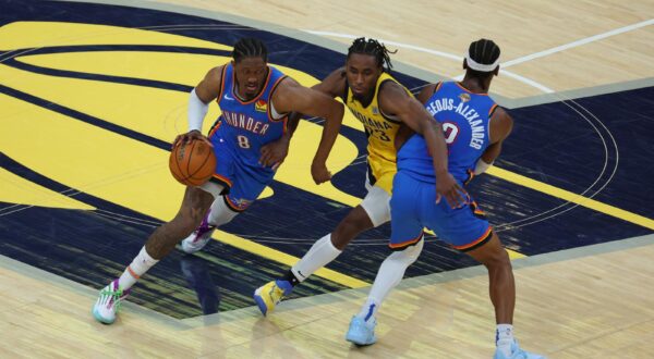 Jun 13, 2025; Indianapolis, Indiana, USA; Oklahoma City Thunder forward Jalen Williams (8) drives to the hoop as Oklahoma City Thunder guard Shai Gilgeous-Alexander (2) blocks Indiana Pacers forward Aaron Nesmith (23) during the fourth quarter of game four of the 2025 NBA Finals at Gainbridge Fieldhouse. Mandatory Credit: Trevor Ruszkowski-Imagn Images/Sipa USA Photo: Imagn Images/SIPA USA