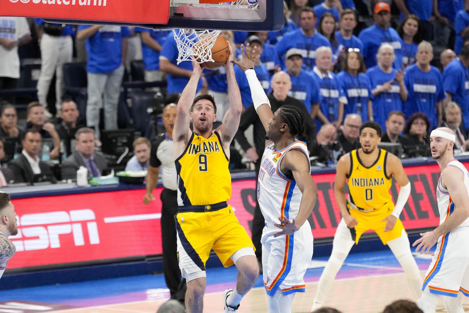 Jun 16, 2025; Oklahoma City, Oklahoma, USA; Indiana Pacers guard T.J. McConnell (9) shoots the ball over Oklahoma City Thunder forward Jalen Williams (8) during the third quarter in game five of the 2025 NBA Finals at Paycom Center. Mandatory Credit: Kyle Terada-Imagn Images/Sipa USA Photo: Imagn Images/SIPA USA