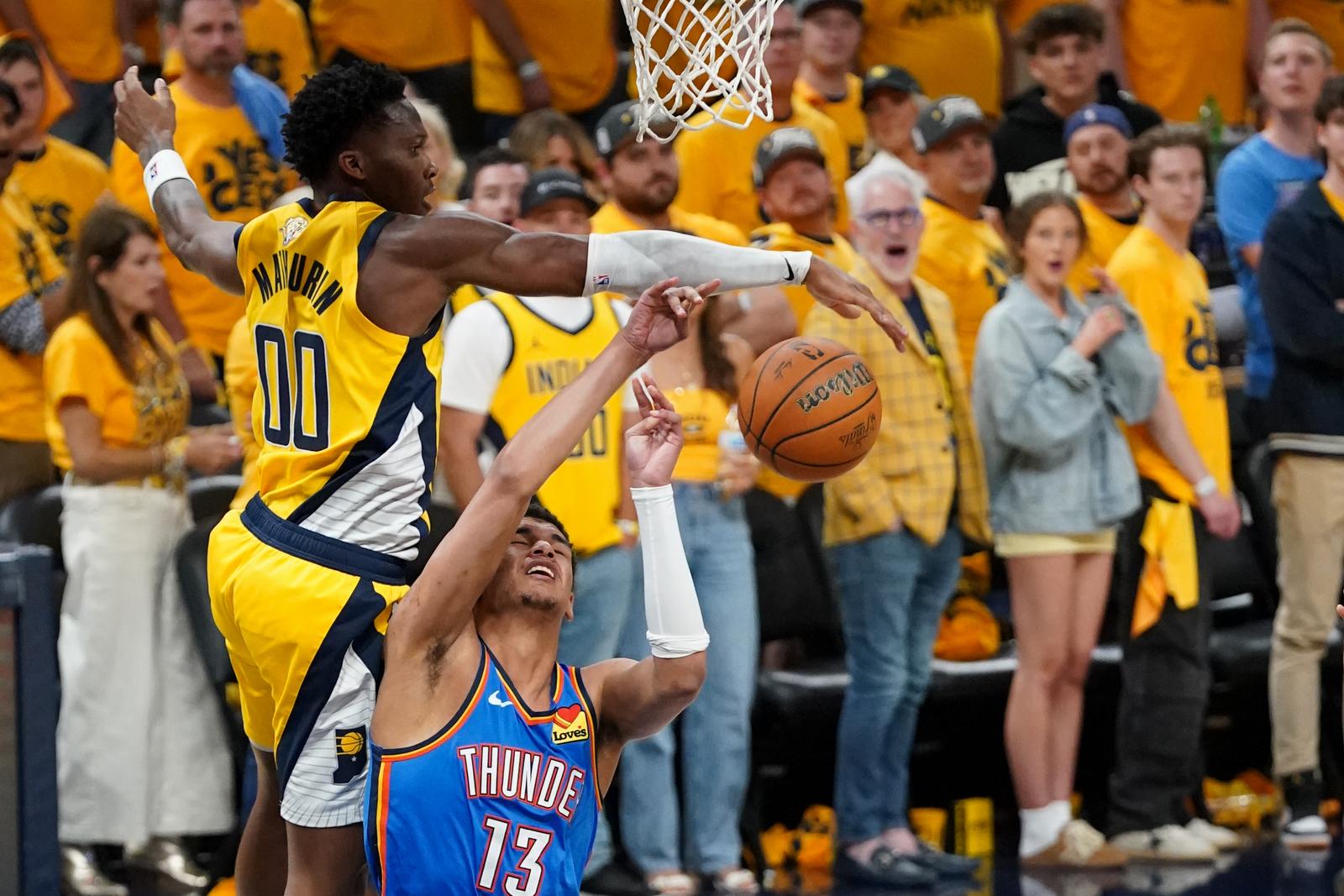Jun 19, 2025; Indianapolis, Indiana, USA; Indiana Pacers guard Tyrese Haliburton (0) blocks a shot by Oklahoma City Thunder forward Ousmane Dieng (13) in the second half during game six of the 2025 NBA Finals at Gainbridge Fieldhouse. Mandatory Credit: Kyle Terada-Imagn Images/Sipa USA Photo: Imagn Images/SIPA USA