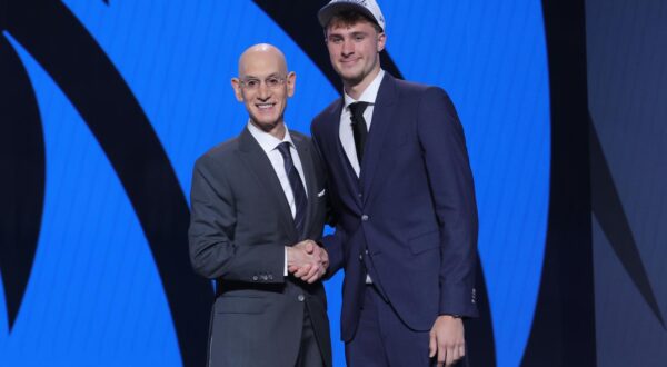 Jun 25, 2025; Brooklyn, NY, USA;  Cooper Flagg poses with NBA commissioner Adam Silver after being selected as first overall by the Dallas Mavericks in the first round of the 2025 NBA Draft at Barclays Center. Mandatory Credit: Brad Penner-Imagn Images/Sipa USA Photo: Imagn Images/SIPA USA