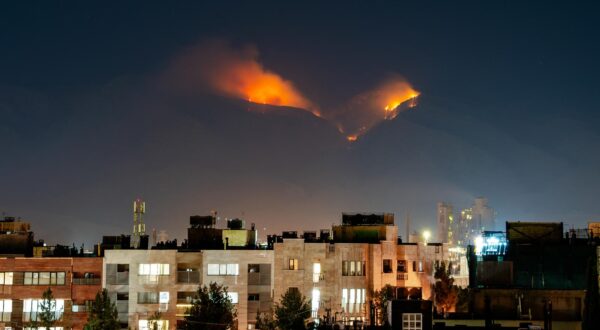 Smoke rises as fire burns, in an alleged site of IRGC's missile launch targeted by Israel on the mountains of Shiraz, Iran on June 21, 2025. Israel attacked Iran in early hours of June 13, and the exchange of fire between the two countries continues ever since. Photo by Hiroon/Middle East Images/ABACAPRESS.COM Photo: Middle East Images/ABACA/ABACA