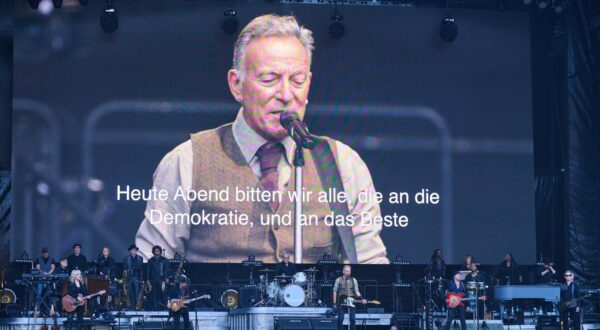 11 June 2025, Berlin: During Bruce Springsteen and The E Street Band's concert at the Olympic Stadium, the following text will run across the big screen: "The America that I love, that I've written about for you, that has been a beacon of hope and freedom for 250 years, is currently in the hands of a corrupt, incompetent and lying government. Tonight, we ask all who believe in democracy and the best to raise their voices and let freedom ring." Photo: Annette Riedl/dpa Photo: Annette Riedl/DPA