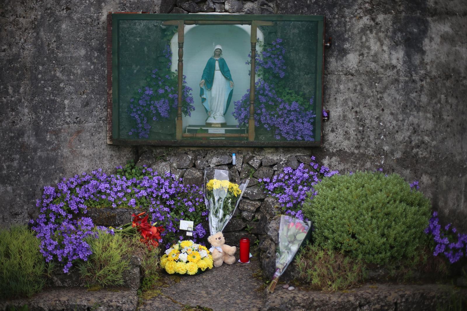 Probe into mother and baby homesFlowers left at the site of a mass grave for children who died in the Tuam mother and baby home, Galway, as the Irish Government has bowed to national and international pressure over the scandal of the death of 4,000 babies who were buried in unmarked, unconsecrated and mass graves at homes for unmarried mothers.Niall Carson Photo: Press Association/PIXSELL