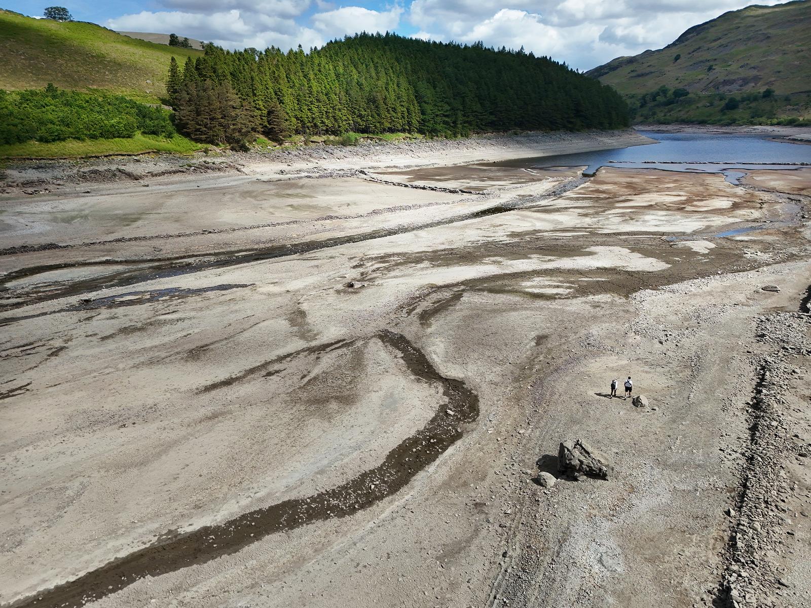 Haweswater reservoir in the valley of Mardale, Cumbria. With the UK set to record its driest spring in over a century it's water levels have dropped so far it has revealed the hidden village of Mardale, which was deliberately flooded in 1939 when the valley was flooded to make the reservoir. Picture date: Friday May 23, 2025. Photo: Owen Humphreys/PRESS ASSOCIATION