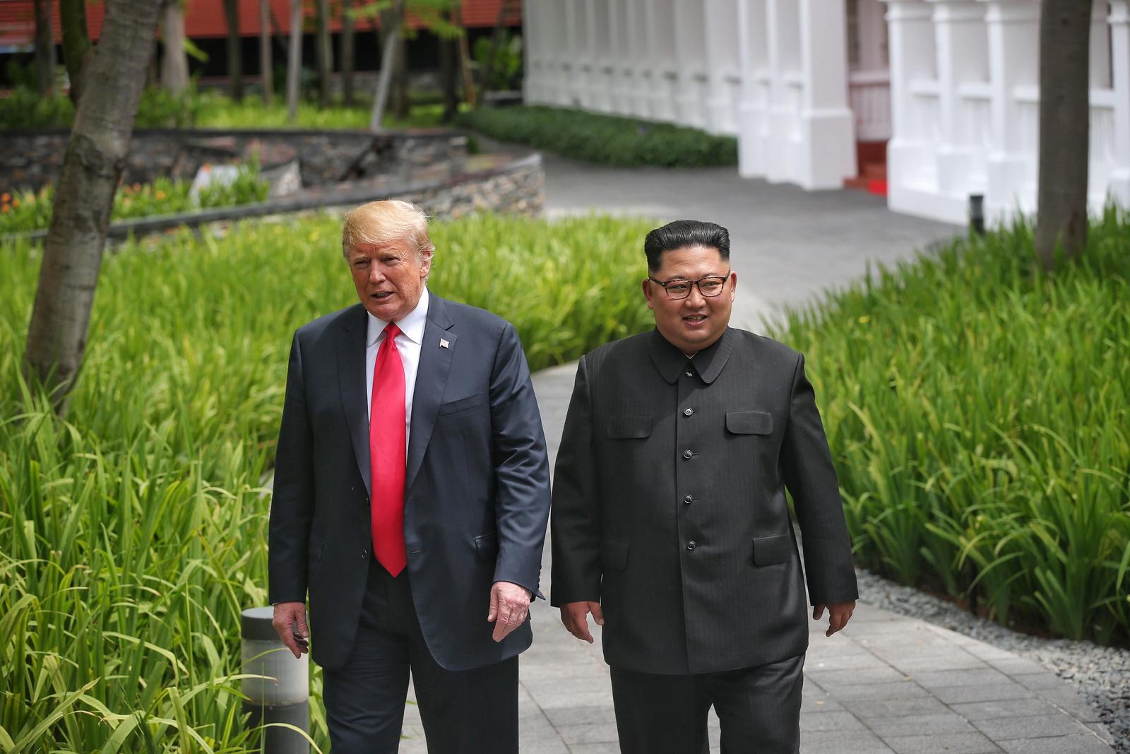 SINGAPORE-DPRK-U.S.-SUMMIT (180612) -- SINGAPORE, June 12, 2018 (Xinhua) -- Top leader of the Democratic People's Republic of Korea (DPRK) Kim Jong Un (R) and U.S. President Donald Trump take a walk during their summit meeting in Singapore on June 12, 2018. (Xinhua/Ministry of Communication and Information of Singapore) (dtf) Li Peng  Photo: XINHUA/PIXSELL