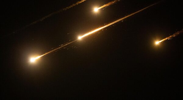 (250613) -- JERUSALEM, June 13, 2025 (Xinhua) -- Bright Traces are seen over Jerusalem during missile attacks launched by Iran to Israel, on June, 13, 2025. Dozens of missiles were fired from Iran into Israel on Friday evening, according to statements issued by the Israel Defense Forces (IDF). (Xinhua/Chen Junqing) Photo: Chen Junqing/XINHUA