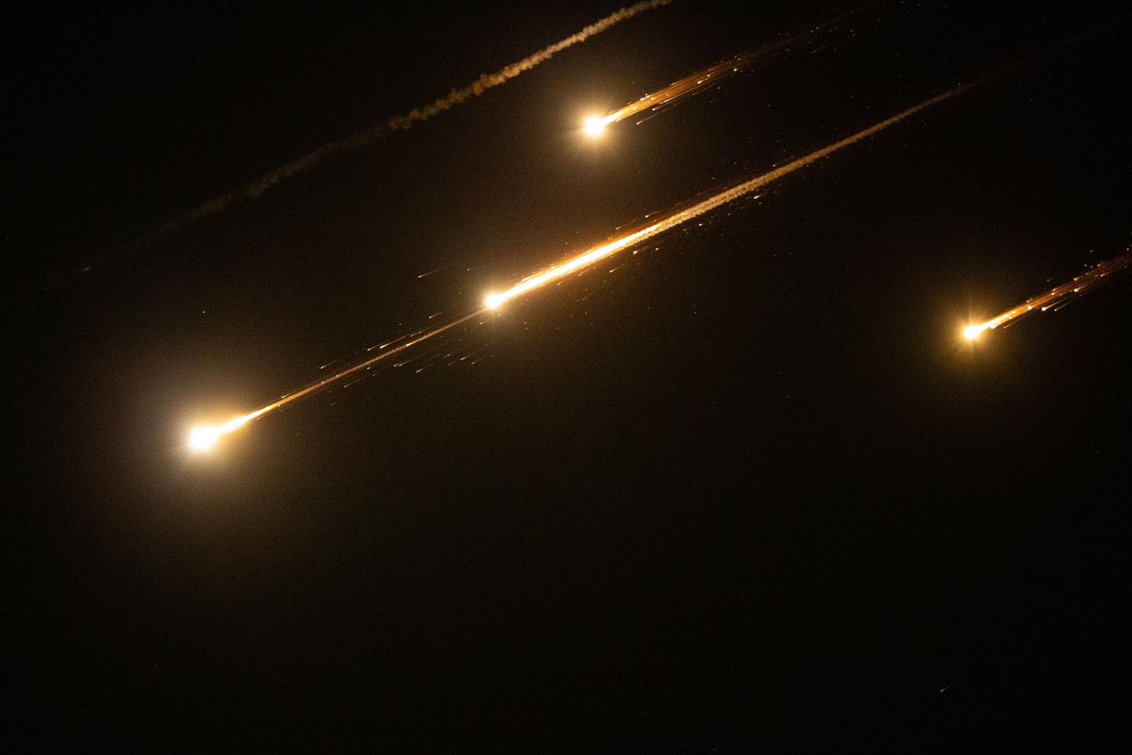 (250613) -- JERUSALEM, June 13, 2025 (Xinhua) -- Bright Traces are seen over Jerusalem during missile attacks launched by Iran to Israel, on June, 13, 2025. Dozens of missiles were fired from Iran into Israel on Friday evening, according to statements issued by the Israel Defense Forces (IDF). (Xinhua/Chen Junqing) Photo: Chen Junqing/XINHUA