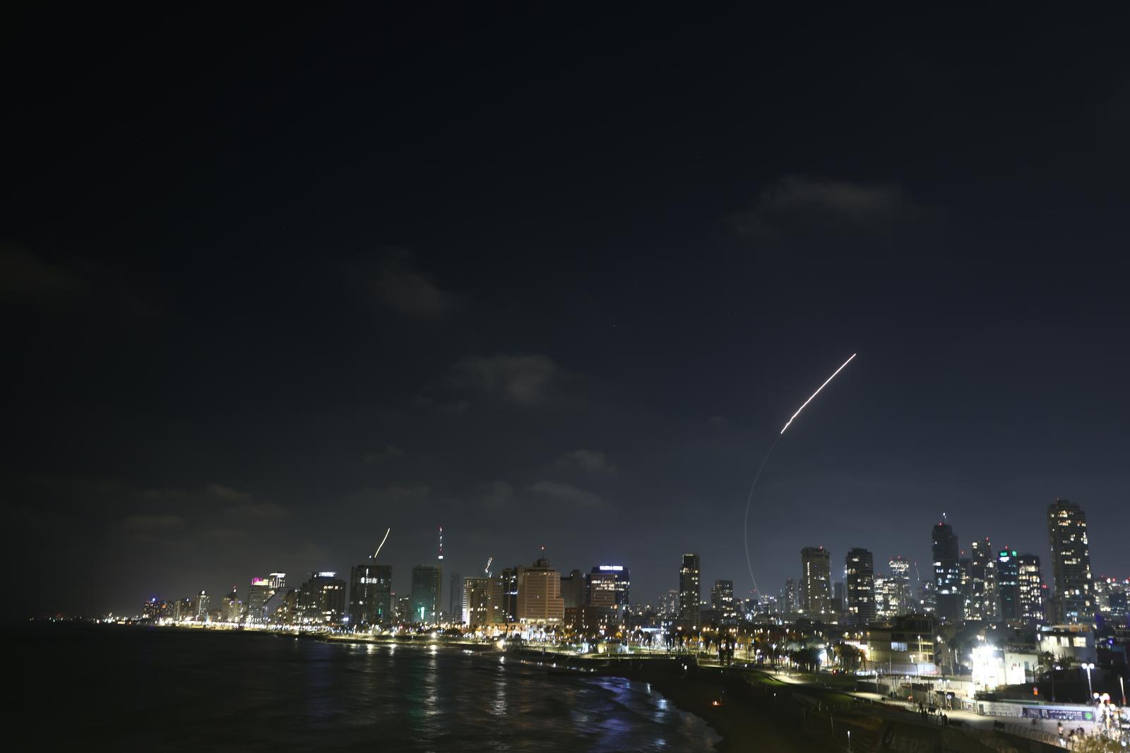 (250614) -- BEIJING, June 14, 2025 (Xinhua) -- Israeli air defense system fires to intercept missiles over Tel Aviv, Israel, on June 13, 2025. Dozens of missiles were fired from Iran into Israel on Friday evening, according to statements issued by the Israel Defense Forces (IDF). (Photo by Jamal Awad/Xinhua) Photo: Jamal Awad/XINHUA
