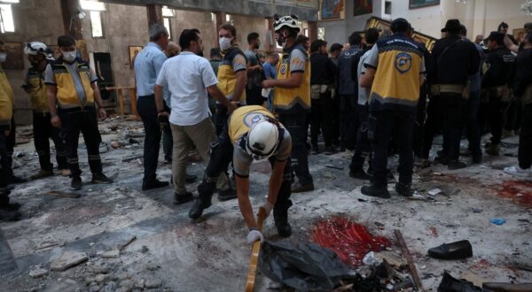 epa12191553 Emergency services work at the scene of a suicide bombing at Mar Elias Church on the outskirts of Damascus, Syria, 22 June 2025. Syrian authorities reported at least nine killed and 13 others injured in the attack, adding the suicide bomber was affiliated with the so-called Islamic State (IS or ISIS) terrorist organization.  EPA/MOHAMMED AL RIFAI
