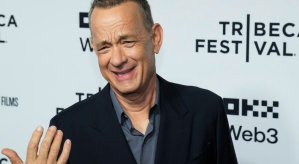 Tom Hanks attends the Tribeca Festival opening night premiere of "Billy Joel: And So It Goes" at the Beacon Theatre on Wednesday, June 4, 2025, in New York. (Photo by Charles Sykes/Invision/AP) 2025 Tribeca Festival - "Billy Joel: And So It Goes" Premiere