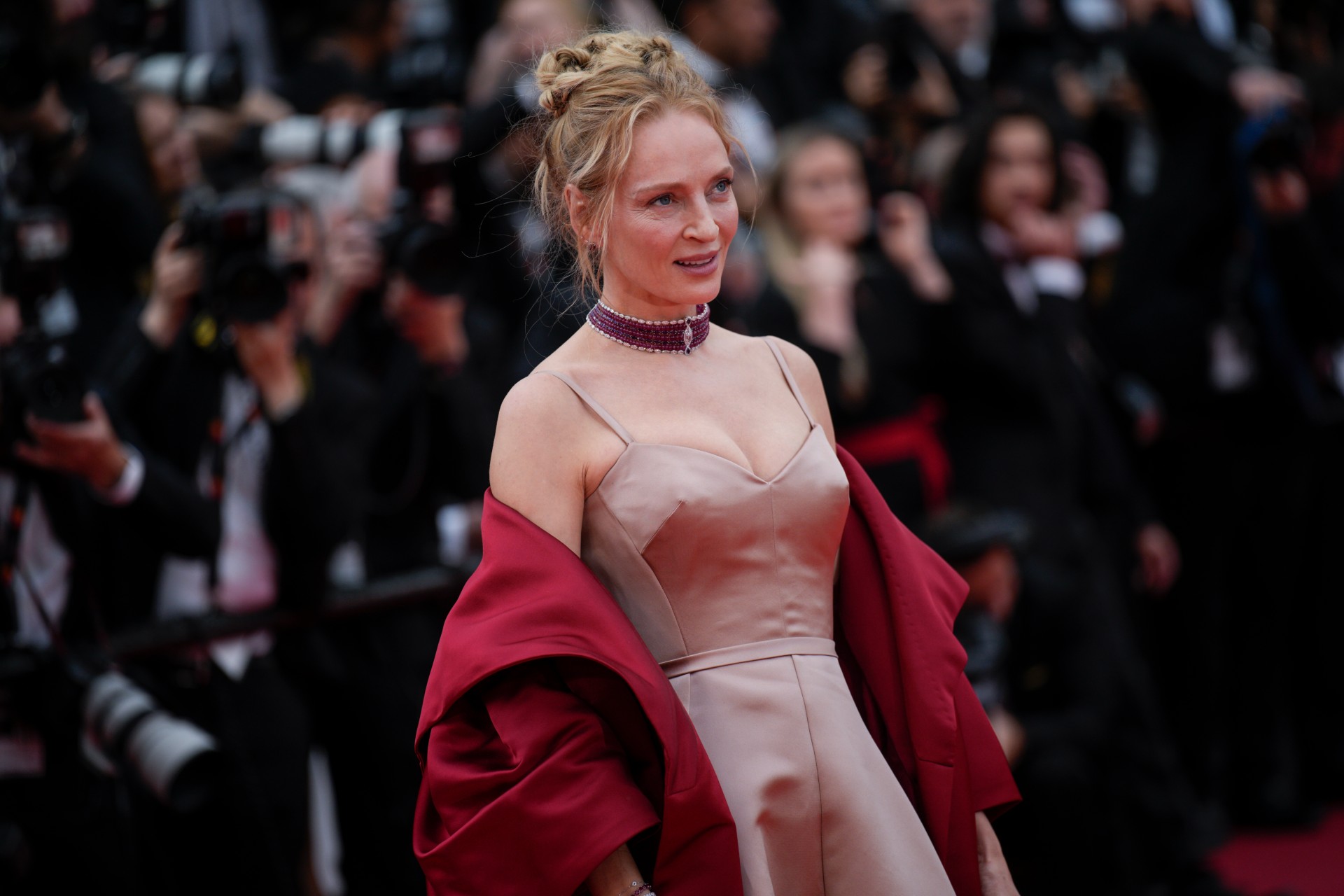Uma Thurman poses for photographers upon arrival at the opening ceremony and the premiere of the film 'Jeanne du Barry' at the 76th international film festival, Cannes, southern France, Tuesday, May 16, 2023. (AP Photo/Daniel Cole) France Cannes 2023 Opening Ceremony Red Carpet