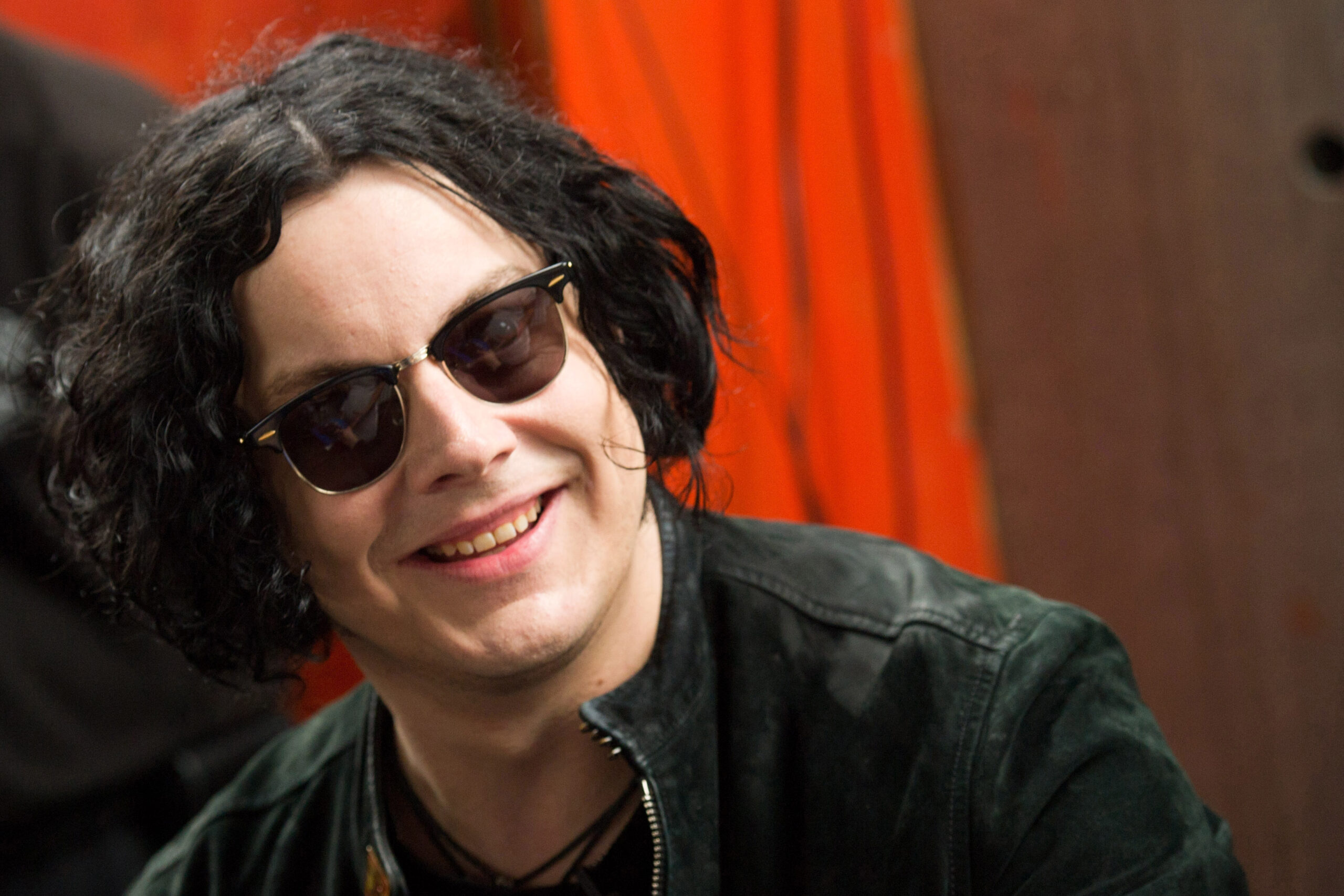 FILE - In this June 24, 2011 file photo, Jack White signs copies of the record he made with Stephen Colbert in New York. The former White Stripe has released his first solo album, Blunderbuss." (AP Photo/Charles Sykes, File)