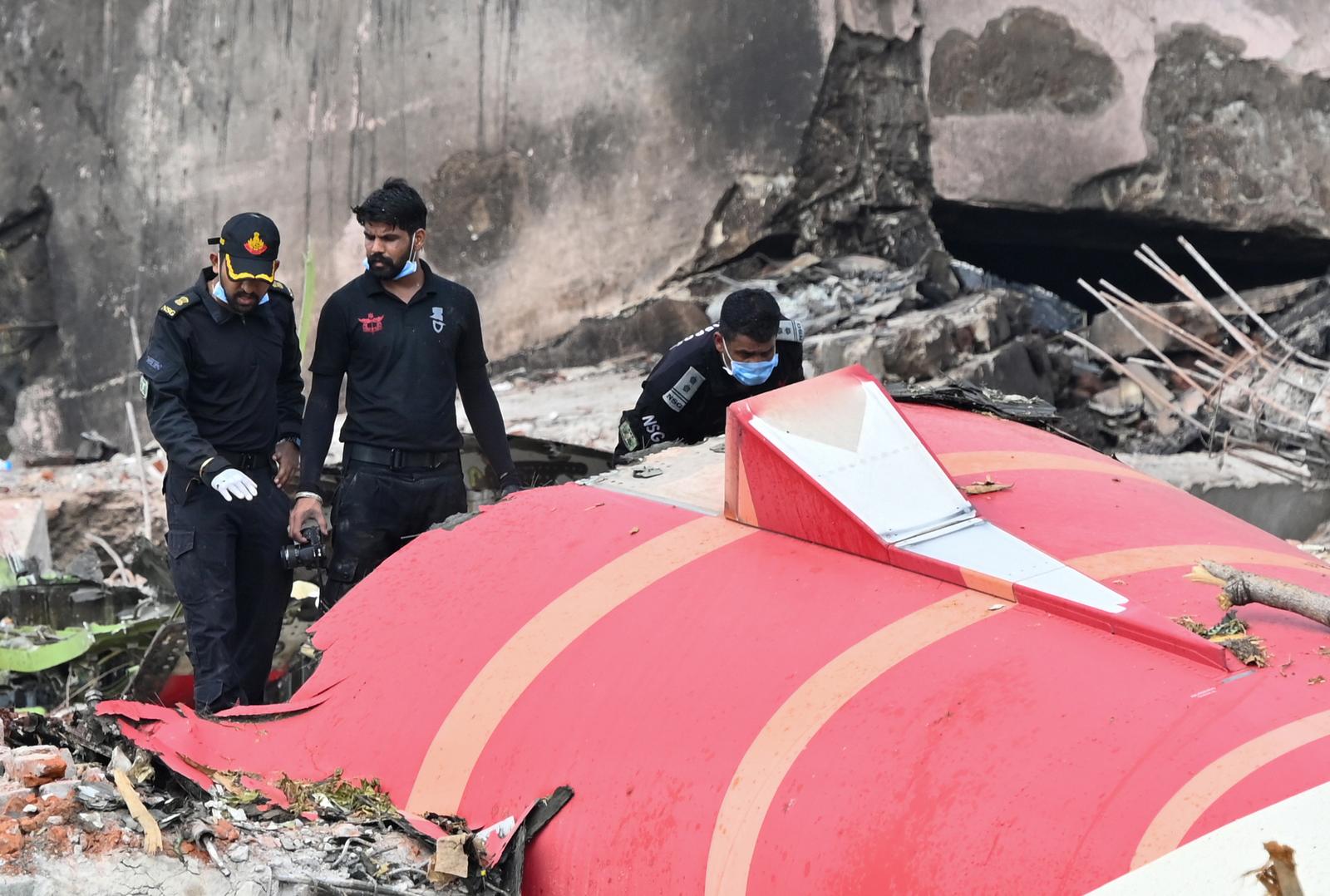 AHMEDABAD, INDIA - JUNE 14: The wreckage of the crashed Air India plane is being lifted by a crane from the roof of the BJ Medical College mess building, on June 14, 2025 in Ahmedabad, India. The Air India flight, which was bound for London, crashed shortly after taking off from Ahmedabad Airport. Around 260 people lost their lives in the incident. (Photo by Raju Shinde/Hindustan Times )  Photo via Newscom Photo: HINDUSTAN TIMES/NEWSCOM