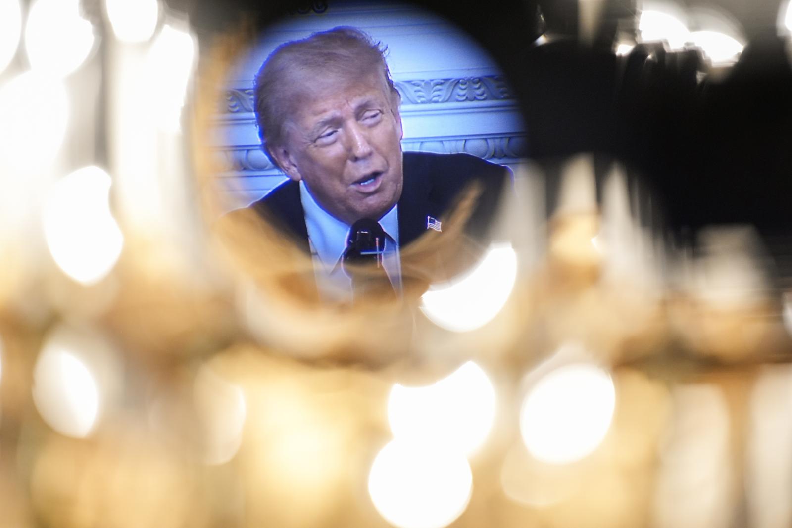A camera records United States President Donald Trump as he speaks at the White House Faith Office Luncheon in the State Dining Room at the White House in Washington on July 14, 2025. 
Credit: Yuri Gripas / Pool via CNP/AdMedia Photo: CNP/AdMedia/NEWSCOM