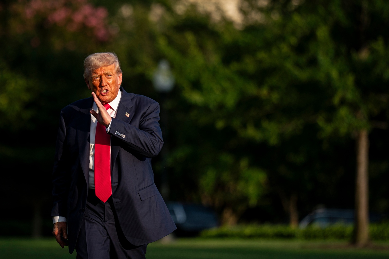 epaselect epa12240022 US President Donald Trump walks on the South Lawn of the White House after arriving on Marine One in Washington, DC, USA, 15 July 2025. Trump hailed more than $92 billion US dollars in investments in artificial intelligence and energy infrastructure during a visit to Pennsylvania, highlighting his efforts to bolster US competitiveness in the AI field.  EPA/Al Drago / POOL