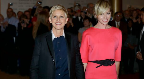 Entertainer Ellen DeGeneres, left, with her wife Portia de Rossi, pose for photographers on the red carpet before DeGeneres receives the 15th annual Mark Twain Prize for American Humor at the Kennedy Center, Monday, Oct. 22, 2012, in Washington. (AP Photo/Alex Brandon) Humor Prize Ellen DeGeneres