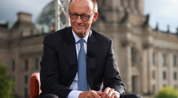 epa12235961 German Chancellor Friedrich Merz poses after the summer interview with public broadcaster ARD in Berlin, Germany, 13 July 2025.  EPA/CLEMENS BILAN