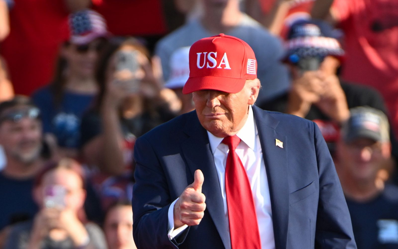 epa12214228 US President Donald J. Trump acknowledges supporters as he arrives before speaking to supporters during a rally at the Iowa State Fairgrounds in Des Moines, Iowa, USA, 03 July 2025. Amoung other issues, Trump will be speaking about the Bipartisan Infrastructure Law in Minnesota.  EPA/CRAIG LASSIG